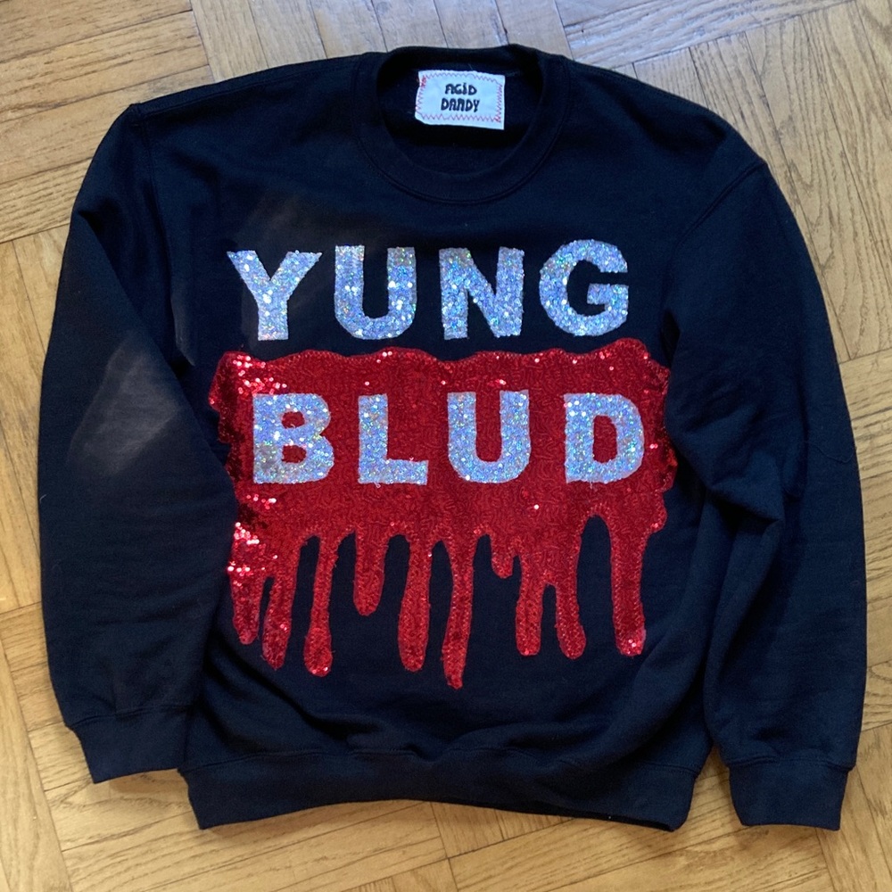 Acid Dandy Yung Blood Black Sweatshirt with Red and Silver Sequin Design.